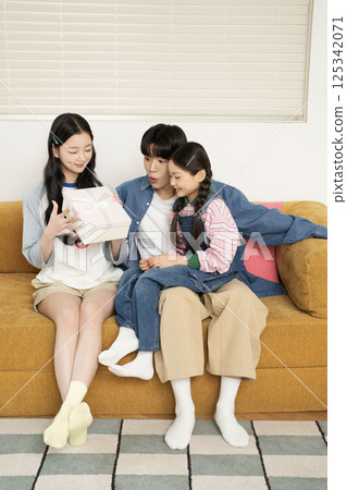 A family catching a cold together A family catching a cold together 125342071