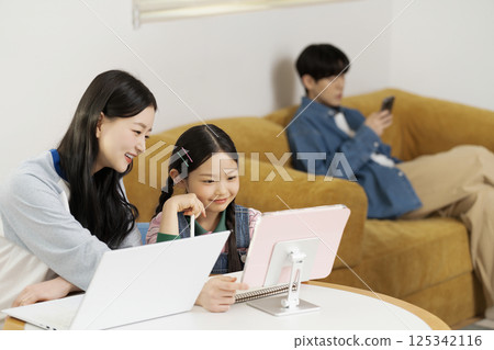 man eating cookies in bed 125342116