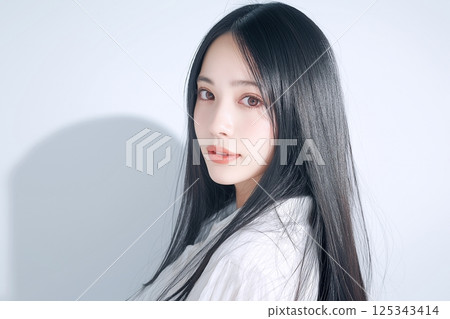 Beautiful black-haired woman "AI generated image" 125343414