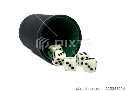 Tipped black dice cup spilling out random assortment of white dice set against a white backdrop Tipped black dice cup spilling out random assortment of white dice set against a white backdrop 125345214