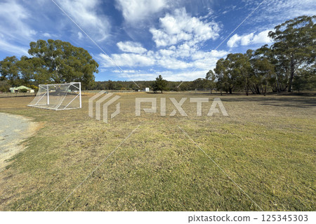 A dry recreational soccer field in regional Australia 125345303