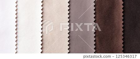 Sample leather textile brown, beige and white colors, background. Catalog and palette tone of Interior fabric 125346317