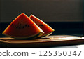 Watermelon slices on a wooden board, fresh and bright, with a dark background copy space 125350347