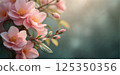 Close-up of beautiful pink blossoms with buds in soft sunlight, showcasing spring and floral beauty 125350356