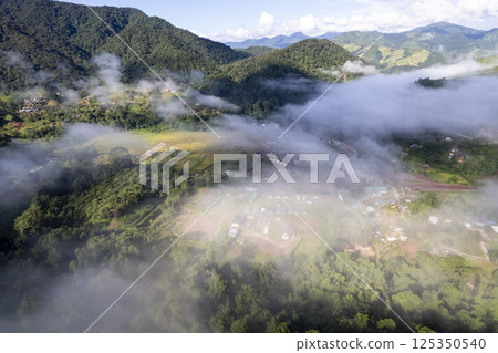 Morning Mist and Viewpoint with Layers of Mountains 125350540
