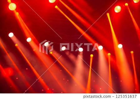 Stage white and red light beams on dark background. Stage lighting for concert. 125351637