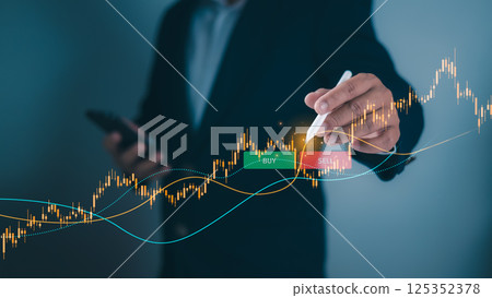 Businessman using pen touch candle chart financial growth of business and world economy, Stock market investment analysis, Financial risk management and investment, Stock market price increase. 125352378