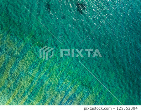 Beautiful landscape summer sea beach nature background,Amazing waves texture background, Aerial view wide angle sea background 125352394