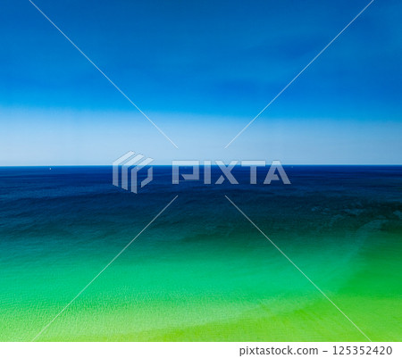 Beautiful landscape summer sea beach nature background,Amazing waves texture background, Aerial view wide angle sea background Beautiful landscape summer sea beach nature background,Amazing waves texture background, Aerial view wide angle sea background 125352420