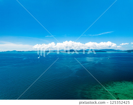 Beautiful landscape summer sea beach nature background,Amazing waves texture background, Aerial view wide angle sea background 125352425