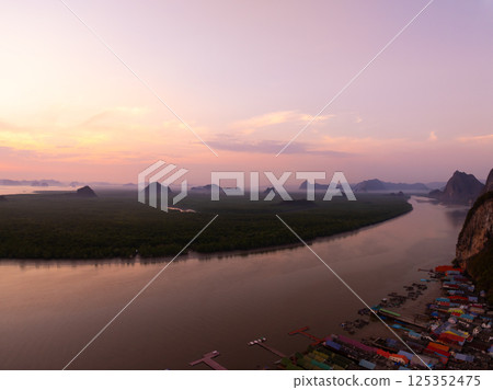 Amazing sunset or sunrise sky over sea landscape,Beautiful colorful light of nature background,Drone camera shot nature view seascape Amazing sunset or sunrise sky over sea landscape,Beautiful colorful light of nature background,Drone camera shot nature view seascape 125352475