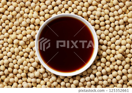 Soybeans and soy sauce poured into a bowl Soybeans and soy sauce poured into a bowl 125352661