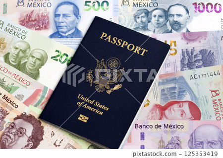 American passport on a Mexican money 125353419