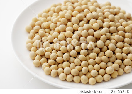 Soybeans on a white plate Soybeans on a white plate 125355228