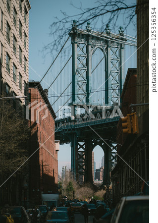 A bridge can be seen connecting two different buildings in a city 125356354