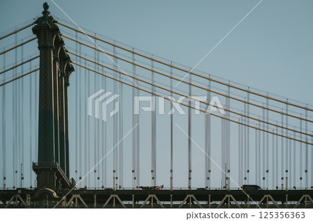Closeup of a bridge with a beautiful blue sky background 125356363