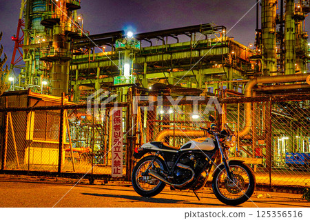 Night view of industrial area and factory with motorcycle Night view of industrial area and factory with motorcycle 125356516