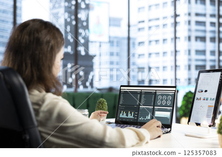 Forecast expert CEO analyzing investment insights and negotiations details, looking at data analytics and reports to establish the corporation vision and objectives. Business productivity. Forecast expert CEO analyzing investment insights and negotiations details, looking at data analytics and reports to establish the corporation vision and objectives. Business productivity. 125357083