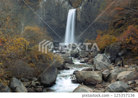 Naena waterfall in foggy autumn season Naena waterfall in foggy autumn season 125357136
