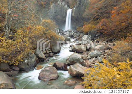 Naena waterfall in foggy autumn season Naena waterfall in foggy autumn season 125357137