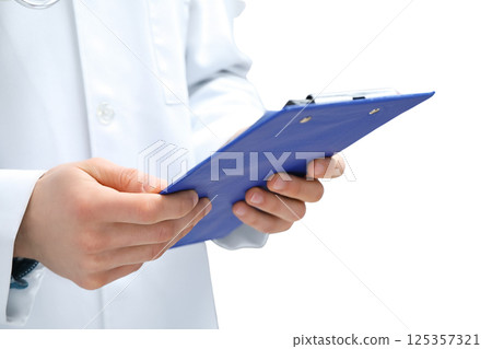 On World Doctor's Day, a doctor preps for patient care with professional focus, isolated on white, PNG 125357321