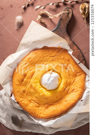 Pao de Lo de Alfeizerao. The traditional Portuguese sponge cake wrapped in the typical paper used on the baking. 125358074