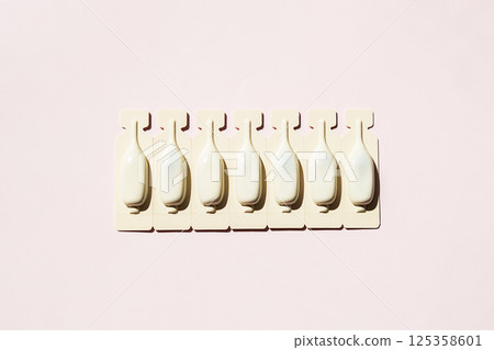 Medical Ampoules in Blister Pack. Representing Dosage Forms for Health and Beauty Treatment. 125358601