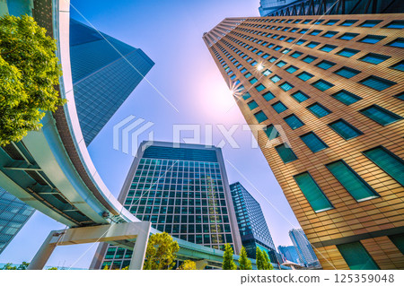 Tokyo cityscape in Japan, a rare sight of the W Diamond...view of the buildings of Shiodome (continuous parking on the Yurikamome line) 125359048
