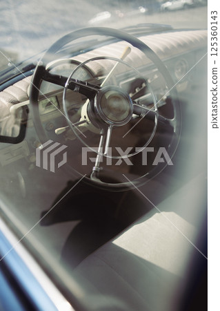 steering wheel of an old car Gaz-21 steering wheel of an old car Gaz-21 125360143