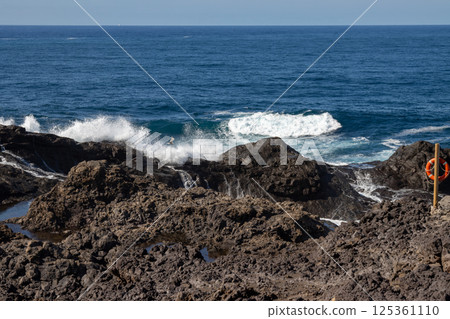 Coastal rocks and Atlantic ocean, Gran Canaria, Spain Coastal rocks and Atlantic ocean, Gran Canaria, Spain 125361110