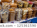 a counter with desserts - honey, cottage cheese and Kazakh delicacies made on the basis of wheat 125361590