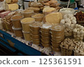 a counter with desserts - honey, cottage cheese and Kazakh delicacies made on the basis of wheat 125361591