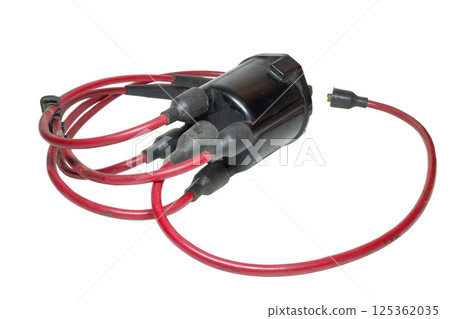 spark plug wires, installed in ignition distributor cap, isolated on white background 125362035