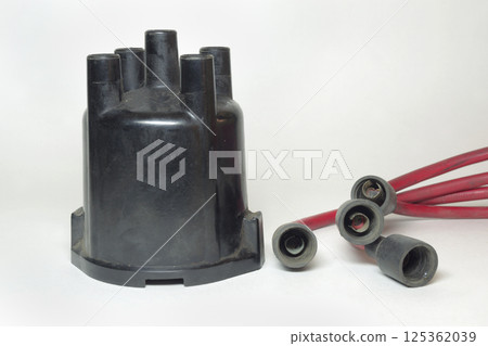 ignition distributor cap front side. set of high tension cables, rubber boots on terminals ignition distributor cap front side. set of high tension cables, rubber boots on terminals 125362039