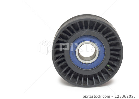 serpentine idler for alternator drive belt. isolated on white background, with clipping path 125362053