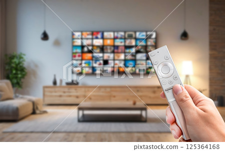 Watching TV, VOD service on TV. 125364168