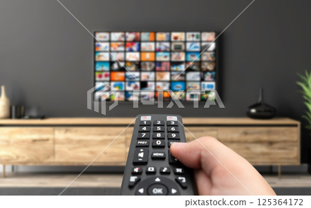 Watching TV, VOD service on TV. 125364172