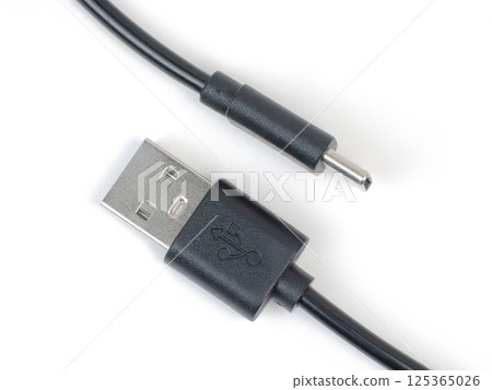 A USB cable with a power connector ready for device charging and data transfer 125365026