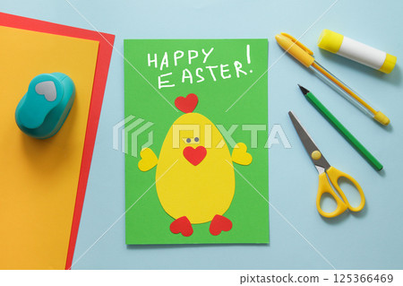 Easter greetings card handcrafted Cockerel. Children's Art Project, needlework, crafts for children. DIY Easter greetings card handcrafted Cockerel. Children's Art Project, needlework, crafts for children. DIY 125366469