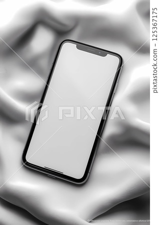 Top View of Smartphone with blank screen. Ideal for placing advertisements, custom graphics or marketing campaigns. Top View of Smartphone with blank screen. Ideal for placing advertisements, custom graphics or marketing campaigns. 125367175