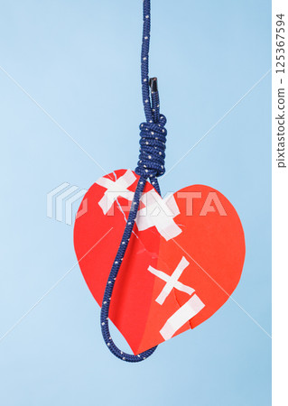 Heart on suicide rope 125367594