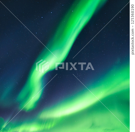 Aurora Borealis, Northern Lights dancing with starry in blue sky Aurora Borealis, Northern Lights dancing with starry in blue sky 125368190