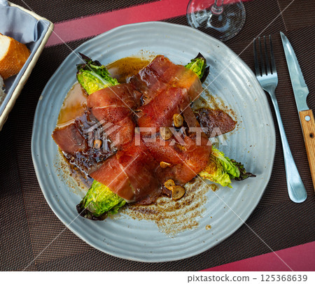 Spanish dish with cabbage and bacon 125368639