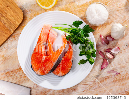 Fresh sliced steaks of salmon Fresh sliced steaks of salmon 125368743