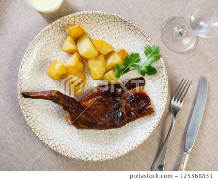 Appetizing stew with rabbit pieces and potatoes. Healthy hearty dinner 125368831