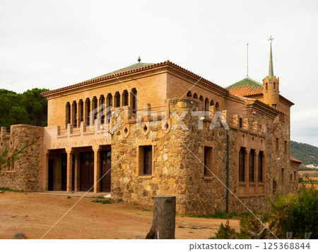 Spanish Colonia Guell teacher's house and school 125368844