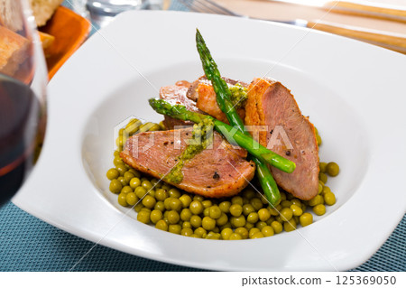 Grilled duck breast with vegetables Grilled duck breast with vegetables 125369050