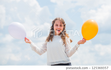 Creative idea. happy birthday party. small girl with party balloon. summer holidays and vacation. childhood happiness. feeling free and carefree. little kid in spring holiday. cheerful child have fun Creative idea. happy birthday party. small girl with party balloon. summer holidays and vacation. childhood happiness. feeling free and carefree. little kid in spring holiday. cheerful child have fun 125369357