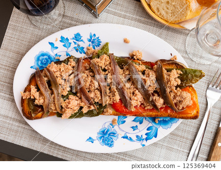 Appetizing Spanish snack Torrada de atun 125369404