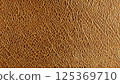 Textured gold leather surface pattern close-up abstract design 125369710